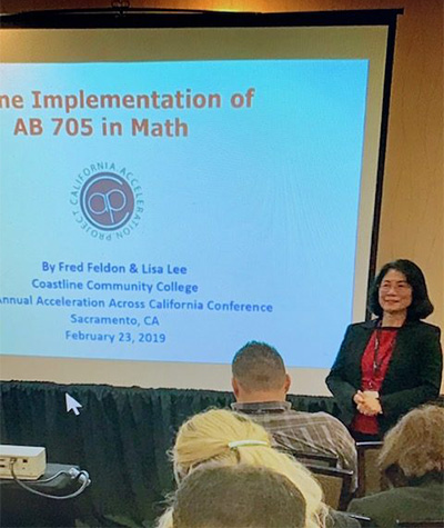 Lisa Lee gives a presentation on AB705 in Mathematics at a conference