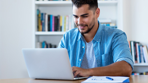 young man on laptop