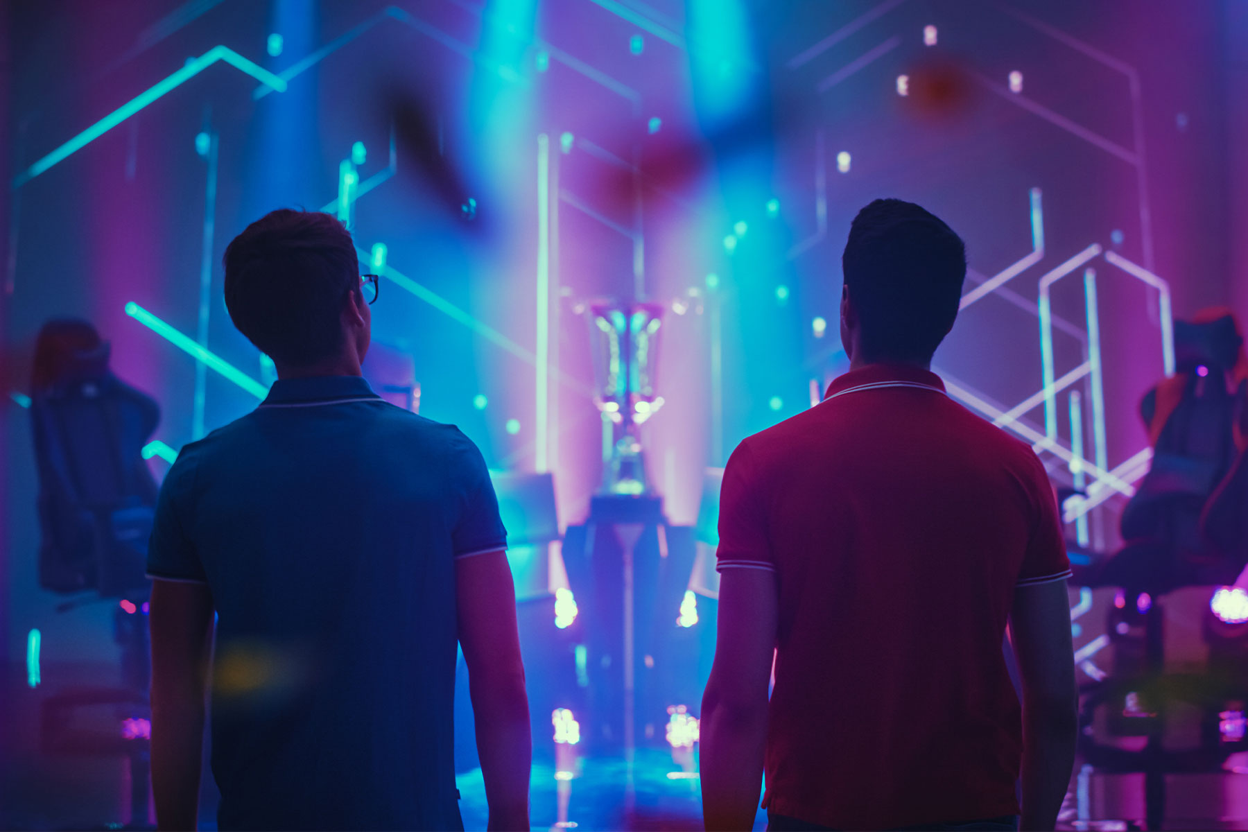 Two Professional eSports Gamers walking on Stage to Participate in the Cyber Games Championship Event.