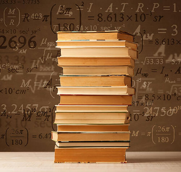 stack of brown books on a background with various math equations