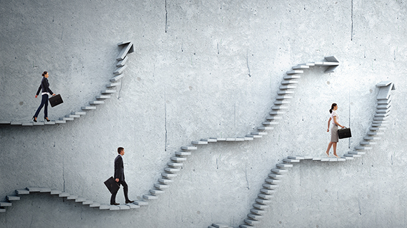 three people climbing three different winding staircases - career development concept