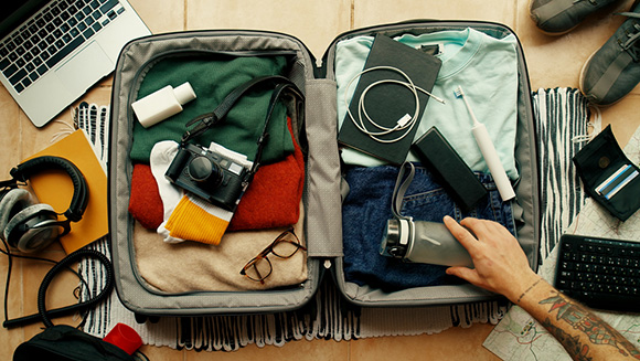 overhead view of a packed suitcase