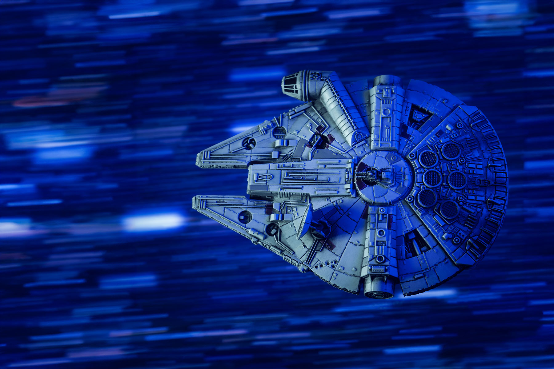 stylized rendering of the millennium falcon from star wars under blue light