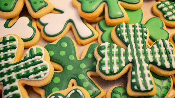 close up of elaboratly decorated shamrock sugar cookies