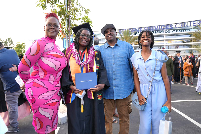 Graduate and family at Coastline Commencement