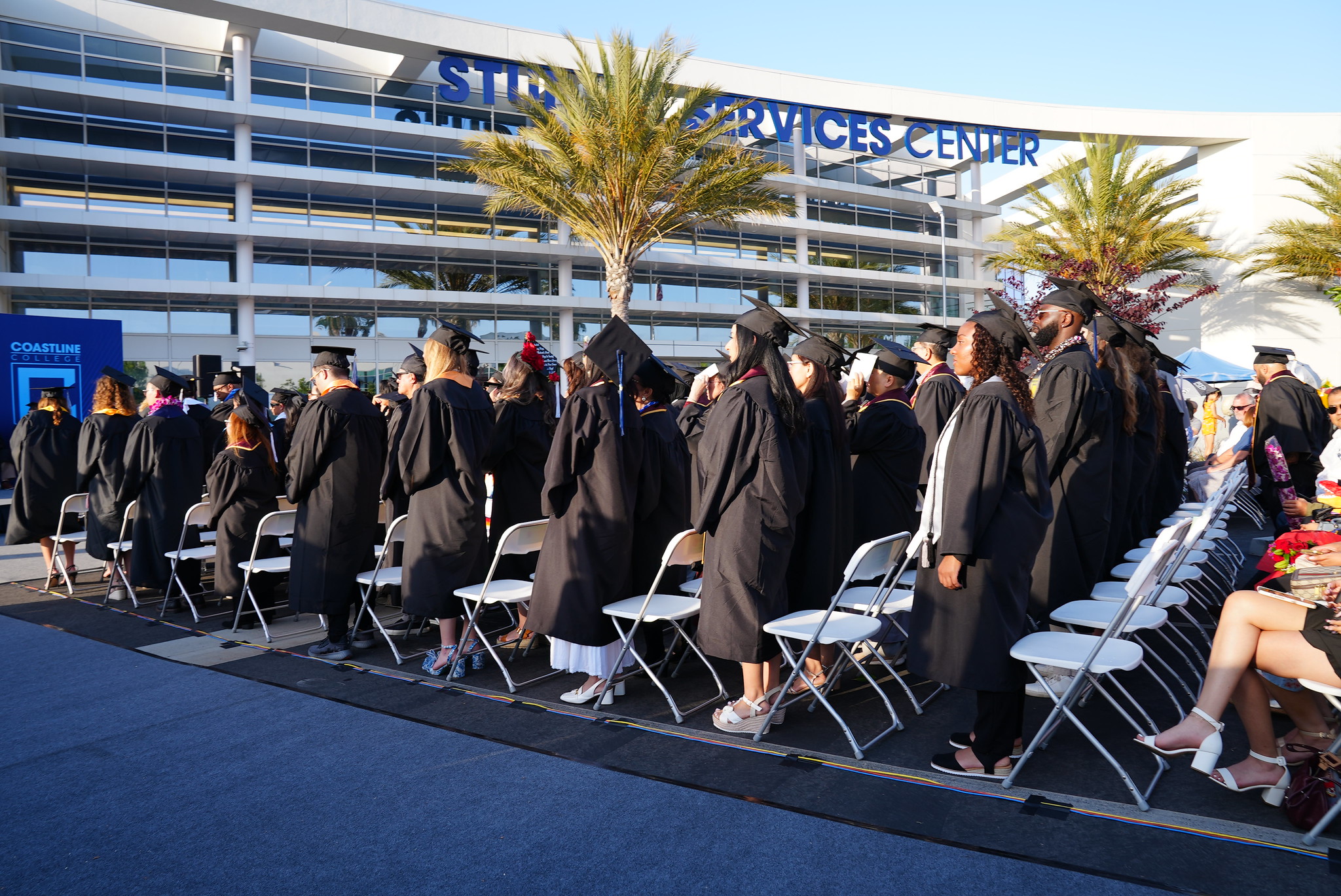 cybersecurity concept background, close up of hands on a laptop with digitized lock graphic over it