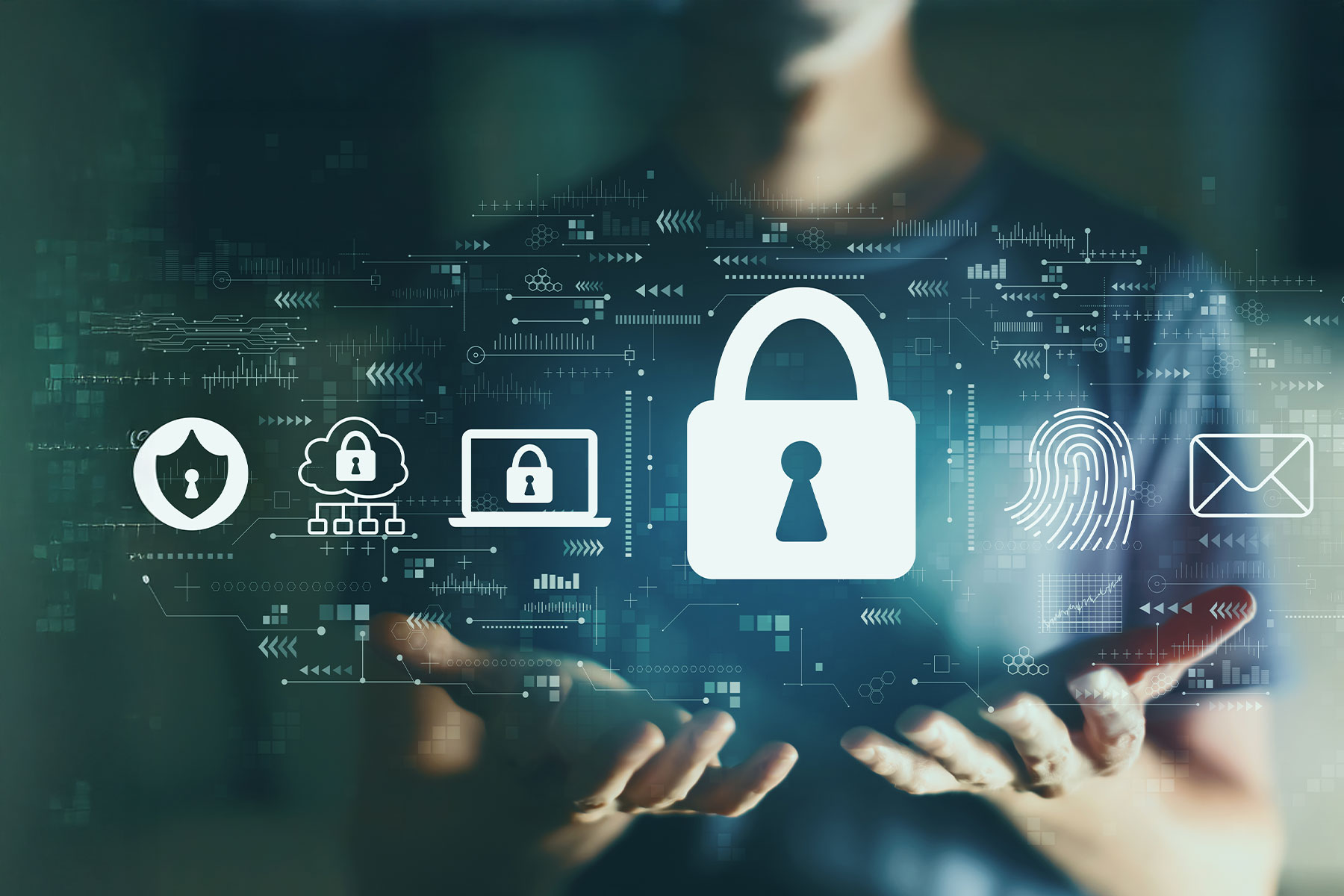 cybersecurity concept background, close up of hands on a laptop with digitized lock graphic over it