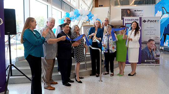 coastline and coast college district leadership cuts ribbon at ribbon cutting ceremony