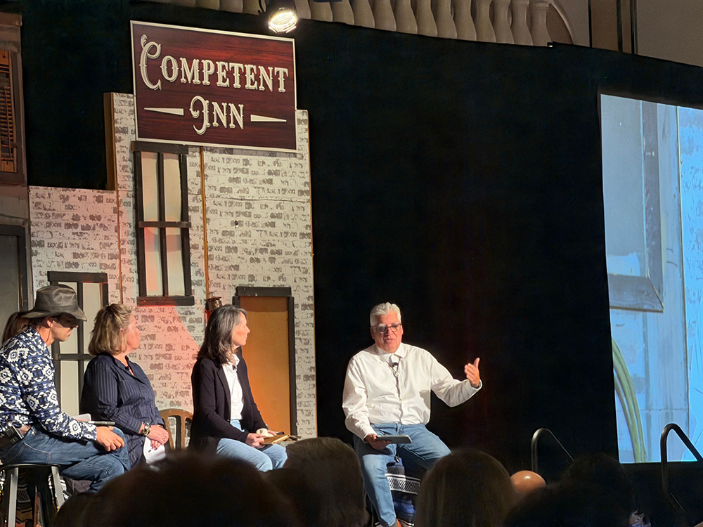 President Vince Rodriguez on stage