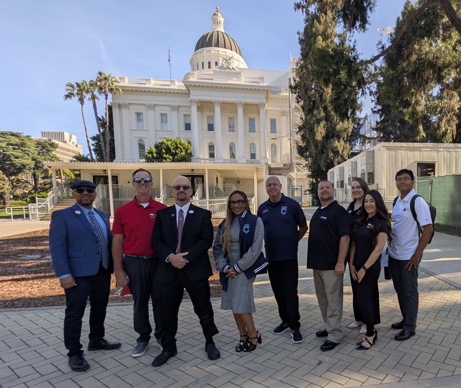Group standing in front of the state capital