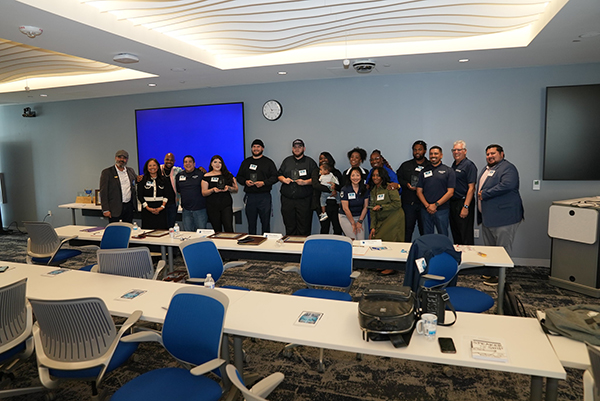 Group photo of graduates and program directors