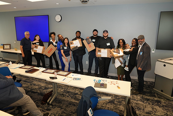 class portrait receiving laptops