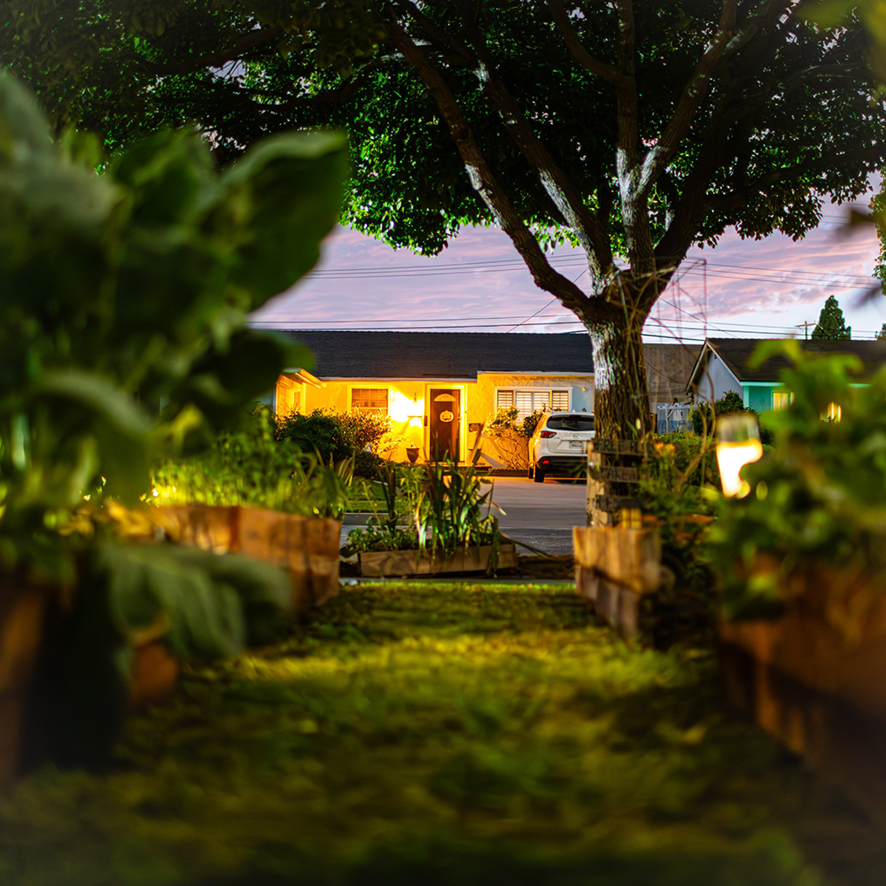 surreal photograph of a house in the evening hours