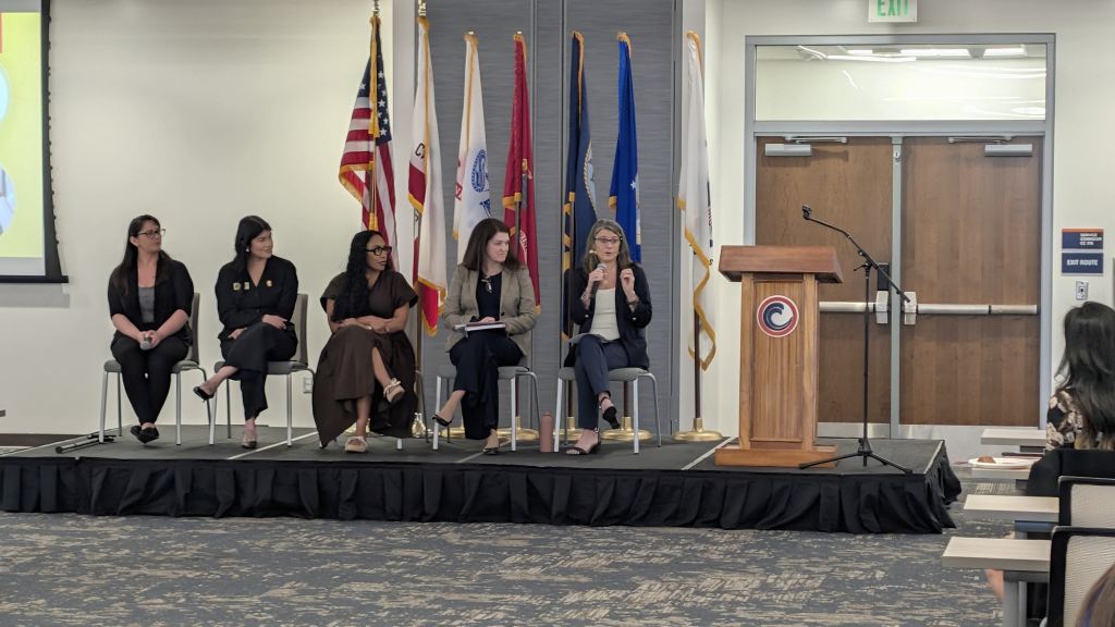Panel of women speaking at the Women Veterans Mental Health and Benefits Symposium in Costa Mesa.